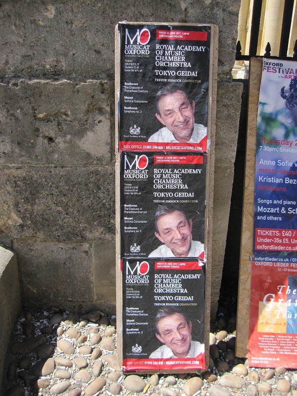 On a notice in front of the Sheldonian Theatre
